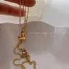 Bijoux en vrac personnalisés non ternis en acier inoxydable plaqué or coeur papillon pendentif collier pour femmes