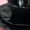 Elama Retro Chic 16-stycken glaserad servis uppsättning i svart