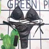 Nuovo bikini alla moda per donna Costume da bagno con logo in metallo Set costume da bagno in materiale speciale Due colori