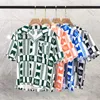 Mens T-shirts Casual Shirts Good Quality Full Rhude Fashion Men 1 Quick Drying Lapel Short Sleeve Button Women Beach Shirt