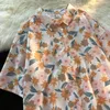 Chemisiers pour femmes Corée Floral Imprimé Chemises Hommes D'été Boutonné Surdimensionné Chemise À Manches Courtes Vintage Plage Hawaii Vêtements Japonais Tops