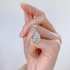 Vattendroppen Moissanite Diamond Dingle Earring 100% Real 925 Sterling Silver Wedding Drop örhängen för kvinnor lovar smycken gåva
