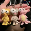 Nyckelringar roliga ful Big Eyed Elephant Cute Cartoon Epoxy Harts Ox Eye Car Keychain Ring Seat Bag Pendant Smycken Pavilion G230526