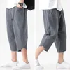 Short élégant pour hommes, pantalon court, taille élastique, jambes larges, confortable, ourlet irrégulier, vêtement pour hommes