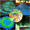 Décorations de jardin 100pcs / lot pierres lumineuses brillent dans le noir cailloux décoratifs allées pelouse aquarium fluorescent goutte lumineuse livrer Dhtsm