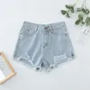 Kvinnors shorts Kvinnors fasta färghål byxor sommar tunn denim jeans botten rippade elastiska tätt casual frayed hög midja