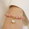 Charm-Armbänder, rosa Opal-Anhänger, Perlenarmband, Qiu Dong, weiblich, Ins-Temperament, kontrahierte Schnur auf dem Stil