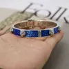 designer sieraden armband ketting ring Qi persoonlijkheid blauw emaille hoofd in elkaar grijpende riem paar armband