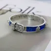 designer sieraden armband ketting ring Qi persoonlijkheid blauw emaille hoofd in elkaar grijpende riem paar armband