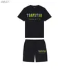 Мужские футболки Мужские футболки Summer Trapstar Printed Cotton Thort Shorts устанавливает уличную одежду для мужской спортивной одежды Trapstar T Roomts and Shorts L230520