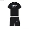 Мужские футболки Мужские футболки Summer Trapstar Printed Cotton Thort Shorts устанавливает уличную одежду для мужской спортивной одежды Trapstar T Roomts and Shorts L230520