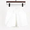 Kvinnors shorts sommar bomullslinne strand shorts kvinnor grundläggande korta byxor mini breda benbyxor damer mode casual hemgata 230613