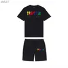 Мужские футболки Мужские футболки Summer Trapstar Printed Cotton Thort Shorts устанавливает уличную одежду для мужской спортивной одежды Trapstar T Roomts and Shorts L230520