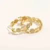 bijoux de créateur bracelet collier bague tournesol boucles d'oreilles cuivre incrusté de zircon or véritable galvanoplastie 925 boucles d'oreilles fleur