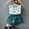 Kläder sätter flickor Nya sommar ärmlös t-shirtandavtryck kjol 2st för barn babykläder kläder
