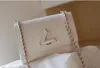 Högkvalitativ nivå av nivå Luxury Designer Bag Twist Denim äkta läder Kvinnor axelväska Låsflik Handväska MM Kvinnor Crossbody Wallet Lady Pochette M50273
