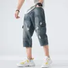 Męskie dżinsy męskie Summer Risped Cargo krótko z dużymi kieszeniami moda w trudnej sytuacji vintage dżinsowe szorty luźne dno rozmiar 42