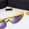 Designer de moda Óculos de sol Lens Designer feminino masculino goggle praia de praia de sol para mulheres homens Óculos de moldes de metal vintage copos de sol com caixa 03qs 1765