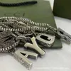 joyería de diseñador pulsera collar anillo inglés viejo tallado pareja suéter cadenas