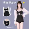 Costumi da bagno da donna Stile coreano Costume da bagno intero a fascia dolce Costume da bagno intero da donna Monokini con maniche lunghe increspato Costume da bagno da spiaggia