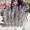 Brosses 30 pièces jetables paillettes cils Mascara brosse violet et argent cils pinceaux de maquillage baguettes applicateur avec porte-clés