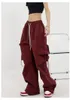 Spodnie damskie Capris w stylu amerykańskim stałym kolorem duży projekt kieszonkowy kombinezon Summer Allmatch Loose Casual Wideleg Spodni Kobiety 230530