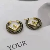 2023 Nieuwe designer sieraden armband ketting ring oorbellen geavanceerd temperament Zwart wit vol diamanten oorbellen