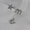 Letter miu diamond studded tassel asymmetric diamond studded pendant earrings pentagram S925 silver needle earrings