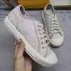 Sapatos casuais masculinos femininos Tênis de renda de couro de viagem designer de moda Tênis de corrida com letras para mulheres Tênis de ginástica masculinos estampados planos Tamanho grande 35-42-45 com caixa