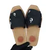 Pantoufles Été Sandales En Caoutchouc Plage WOODY FLAT MULE Lin Blanc Noir Glissière Mode Éraflures Pantoufles Intérieur Toile Designer Chaussures