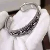 collana di gioielli firmati anello ingranaggio braccialetto tendenza uomo donna con braccialetto aperto di alta qualità