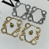 Orecchini di design in oro geometrico Le donne amano le borchie in acciaio inossidabile Gioielli di lusso Orecchini a cerchio per orecchini Orecchini a forma di anagramma in argento