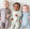 Rompers Bambu Fiber Toddler Jumpsuit Baby Romper kläder Långärmad fotklättring av barns fasta färg bomullskropp för född 230531