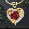 Pendant Necklaces Fashion income. heart-shaped rose necklace with pendant in the of your hand gift for beloved girl.