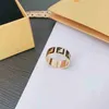 20% di sconto 2023 Nuova collana di braccialetti di gioielli di design Accessori coppia che fa cadere la colla materiale in ottone semplice anello universale smaltato per uomo donna