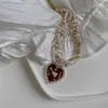 Hänghalsband färgglada l fransk stil retro konstgjord pärla flätad klavikulär kedja hjärtformlegering material för kvinnor