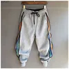 Men's Pants Homme Fashion Hip Hop Streetwear Men Striped Patchwork Harem Pants Korean Loose Fit Cuffed Jogger Sweatpants Trousers For Male L230520