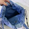 Designer de alta qualidade Mochila pequena mochila de grande capacidade Mulheres Bolsa de jeans azul Bolsa de luxo Bolsa de luxo de lanchonete Bolsa de maquiagem