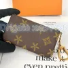 M62650 Womens Genuine Leather key coin purse mens wallet black flower poke card holder keychain luxury Designer small zippy wallets Coin Purses CardHolder Key pouch