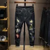 Förstörda jeans för man hiphop stretch svart blå stil streetwear moto cyklist byxor denim byxor oroliga trasiga patchwok