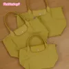 2024 Sac de créateur pour femmes Tote épaule de style européen Sac de loisirs Sac en nylon à main croix pliant broderie