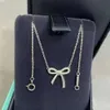 Boîte bleue TF Collier tiff de créateur classique Top T Famille Argent Sterling Petit Noeud Frais Collier Plein Diamant Mode Collier Plaqué Or Chaîne Étoile Même Cadeau