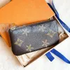 M62650 Womens Genuine Leather key coin purse mens wallet black flower poke card holder keychain luxury Designer small zippy wallets Coin Purses CardHolder Key pouch