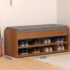 A simple shoe rack integrated with a shoe changing stool and a doorstep shoe cabinet for household use