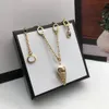 Moda pérola corrente neckalce clássico pingente neckalce mulher casal correntes colar de bronze fornecimento de jóias