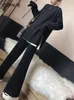 Women Dwuczęściowe spodnie cjfhje beżowy Zachodni zestaw mody Korean Split Black Sweter szerokie nogi 231201