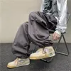 Męskie spodnie Męskie spadochronowe hip-hopowe ulicy kombinezon duże spodnie kieszeni harajuku luźne solidne spodnie dasualne spodnie y2k nogawki 231130