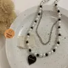 Lyxiga färgglada Pearl Pendant Sweater Heart Choker Halsband för kvinnor Y0124271K