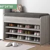 A simple shoe rack integrated with a shoe changing stool and a doorstep shoe cabinet for household use