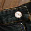 Un pantalon de conception en ruine pour hommes a déchiré une grande taille pantalon de marque en denim en vrac